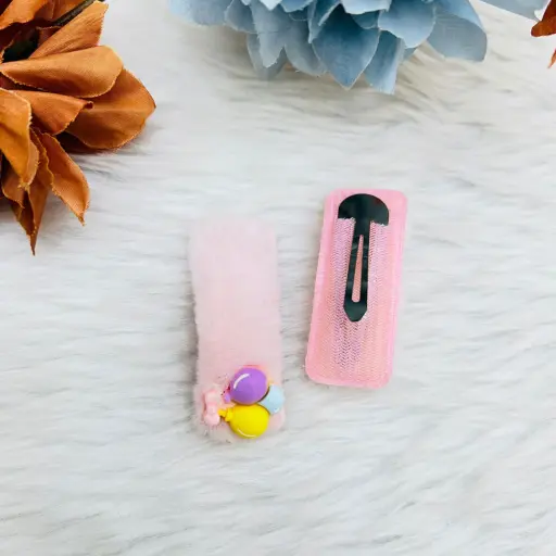 A Set Of Two Colorful Pom Pom Snap Hair Clips 5