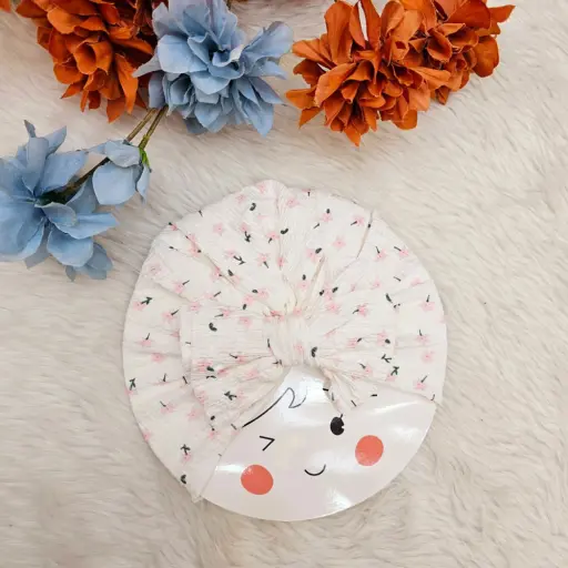 Baby Turban Cap With A Delicate Green Floral Print And A Large Decorative Bow On The Front (3)