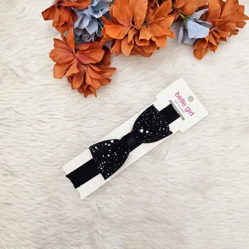 Black Cream Bow With A Speckled Or Glittery Pattern, Attached To An Elastic Headband (3)
