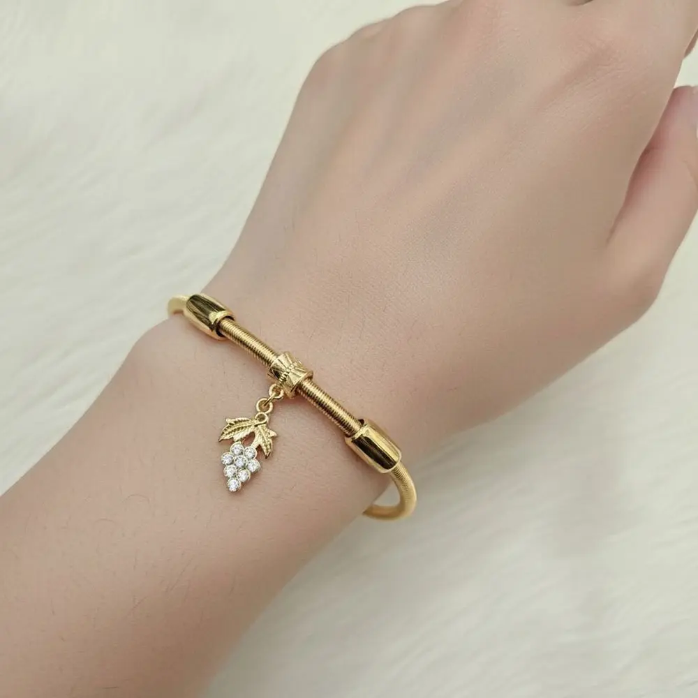 Gold Toned Charm Bracelet With A Crescent Moon And Star Charm 2