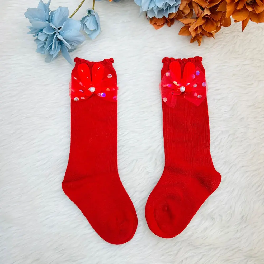 Knee High Socks With A Bow And Sequin Embellishments