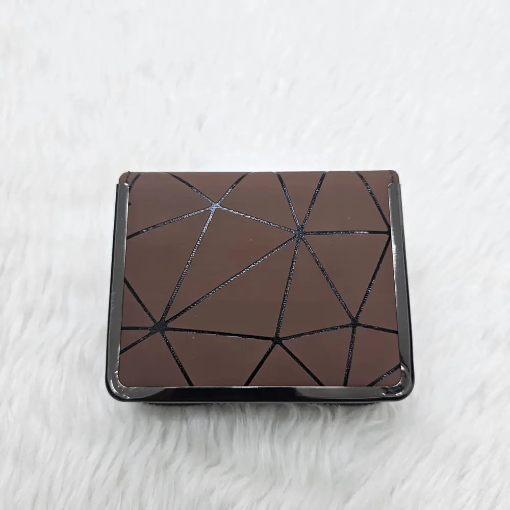 Sling Clutch Hand Purse For Women With A Geometric Pattern And Metal Frame