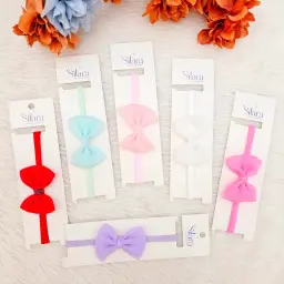 Baby Headbands Featuring Bows In Various Pastel And Bright Colors
