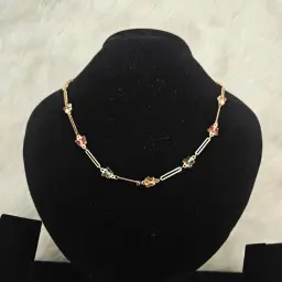 Gold Toned Link Chain Necklace With Multi Colored Floral Accents
