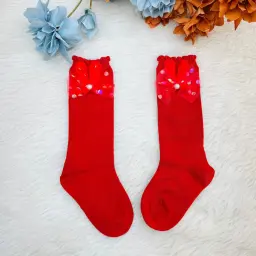 Knee High Socks With A Bow And Sequin Embellishments